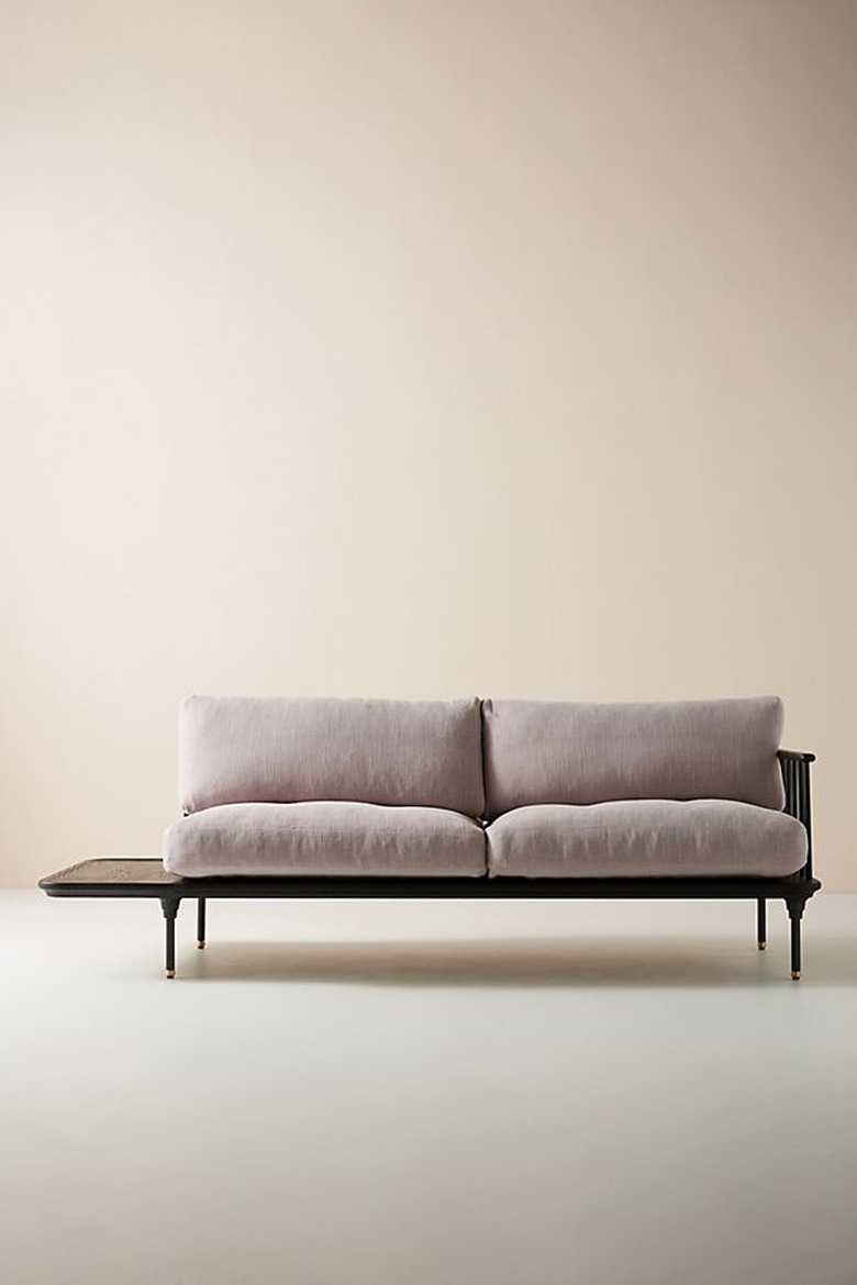 violet sofa with attached side table