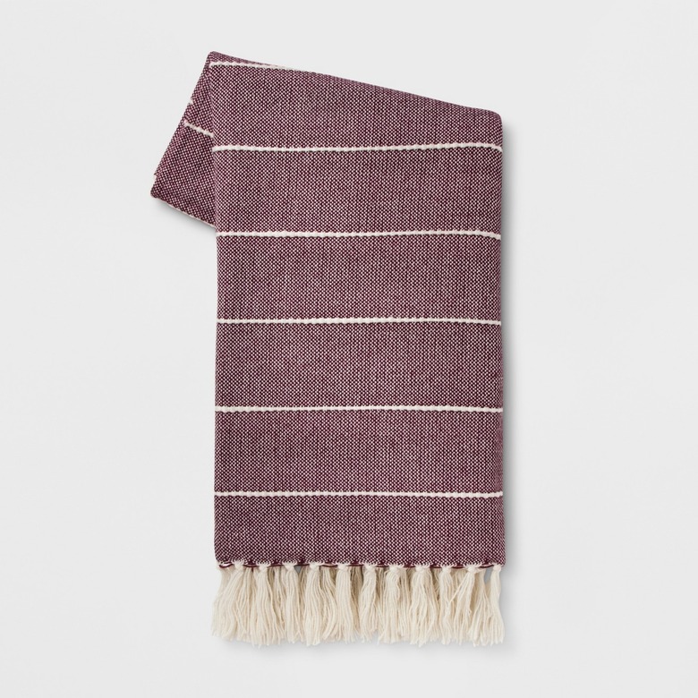 woven throw blanket with stripes and tassel fringe