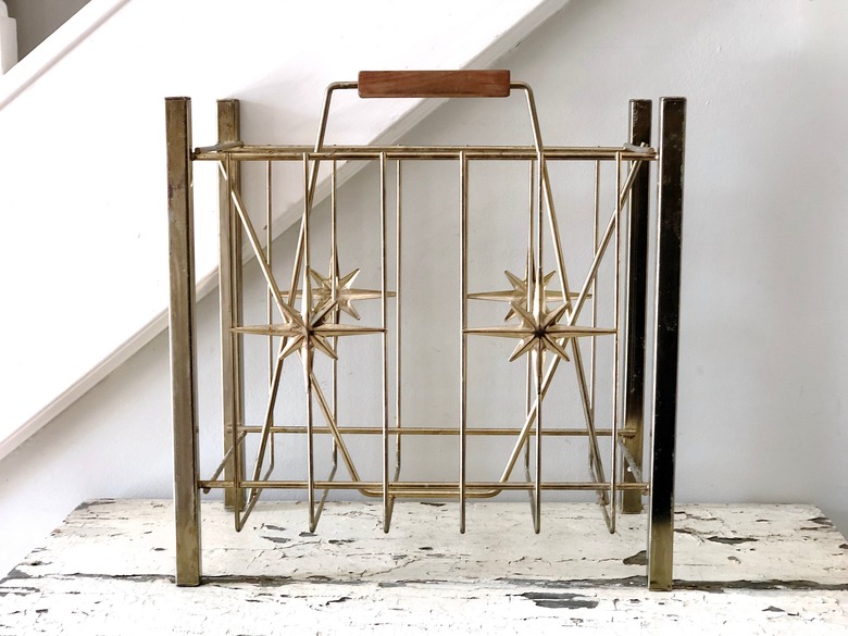 Vintage midcentury gold magazine rack
