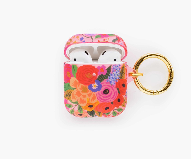floral patterned airpods case with airpods inside