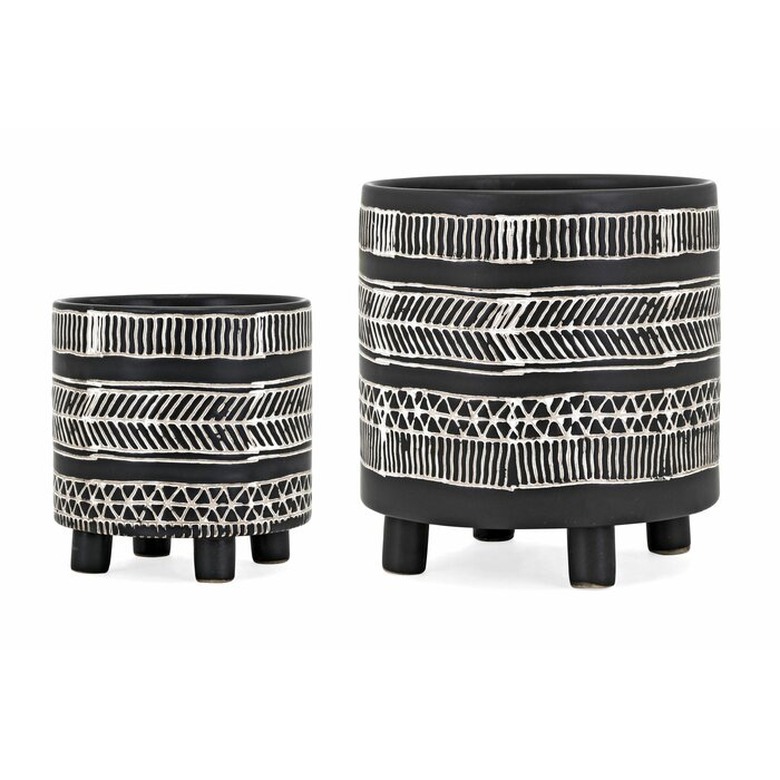 black and white pattern pots with legs
