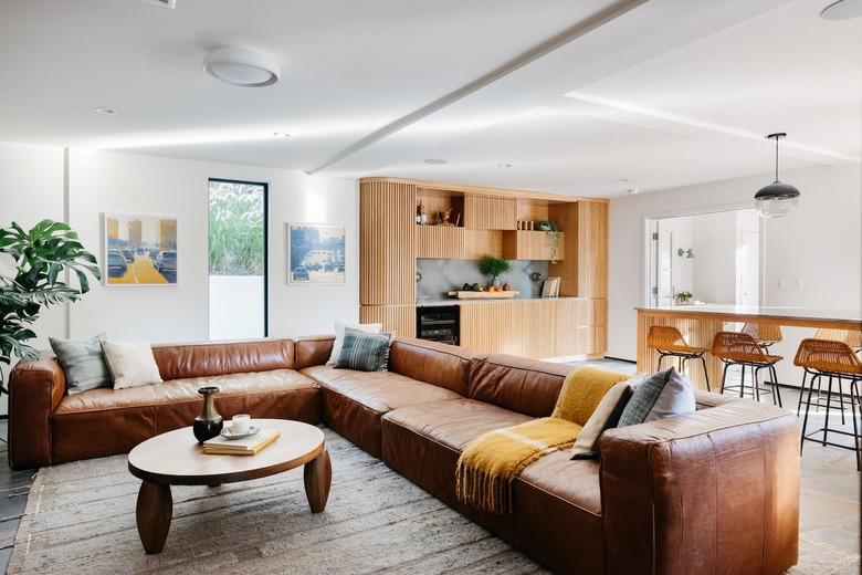 living room with sectional sofa and coffee table