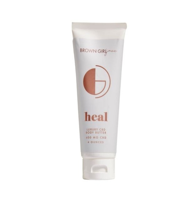 white lotion bottle with rose gold text