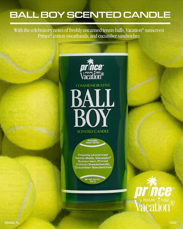 A Ball Boy candle on a bed of tennis balls