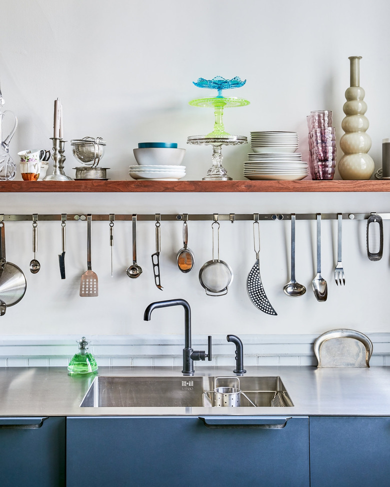 kitchen with stainless steel countertops and integrated sink