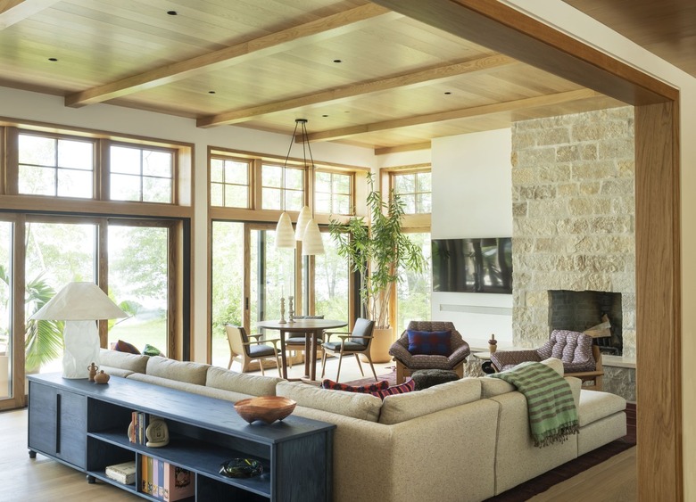 great room with large windows and a beige couch