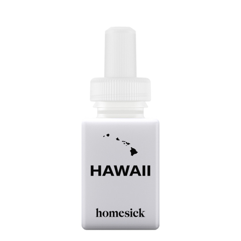 white essential oil bottle with black text and hawaii state outline