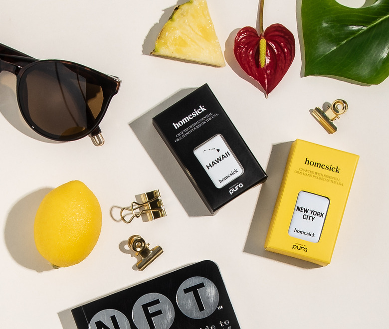 flatlay with essential oil diffuser scents in black and yellow boxes