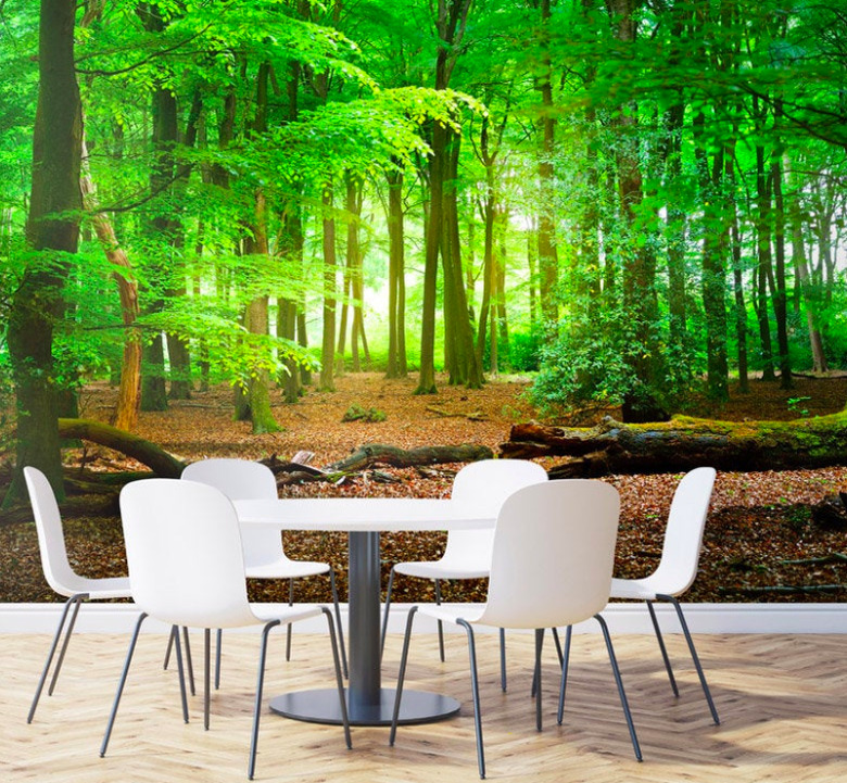 Green forest wallpaper with white table and chairs