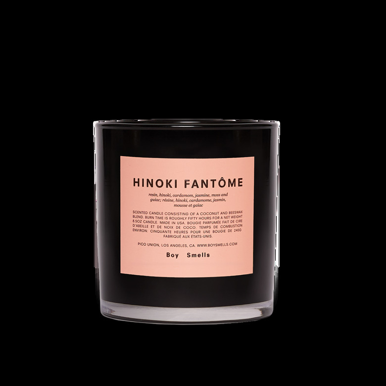 boy smells candle