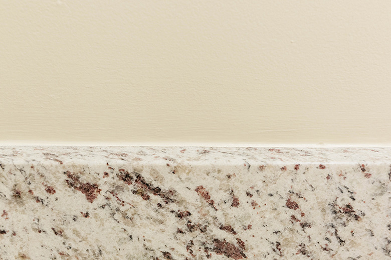 Run new caulk along any areas of the drywall that need it.