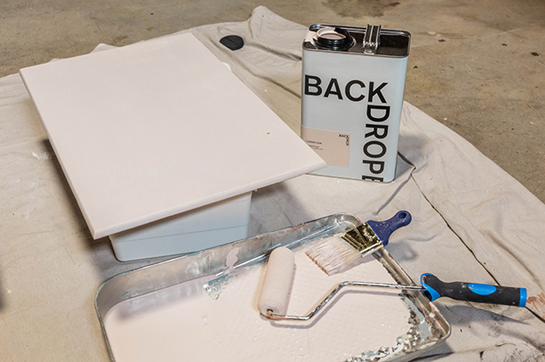 Paint the top coat on the cabinet doors and surround.