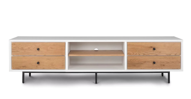 White mid-century TV console with wooden drawers