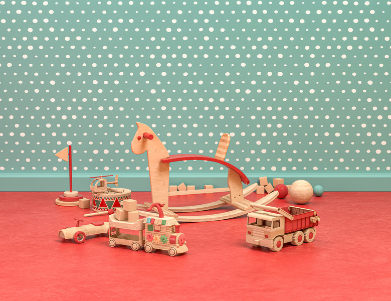 Wood and plastic vintage style playroom with cockhorse and toys on green and red background