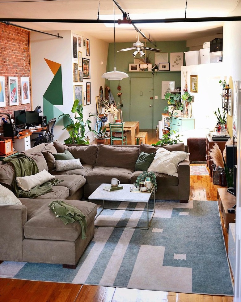 A living room with a brown-gray sectional