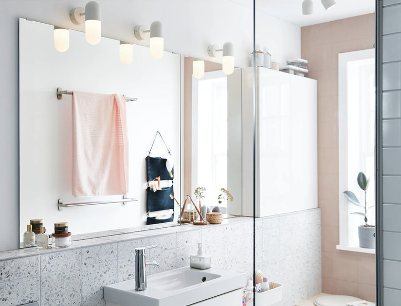 White bathroom with terrazzo tile backsplash