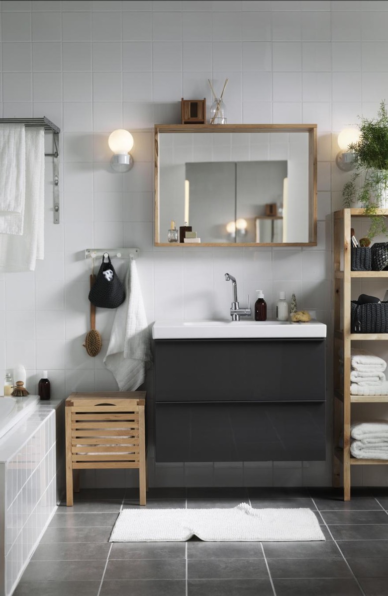 Gray Scandinavian bathroom vanity with dark gray vanity