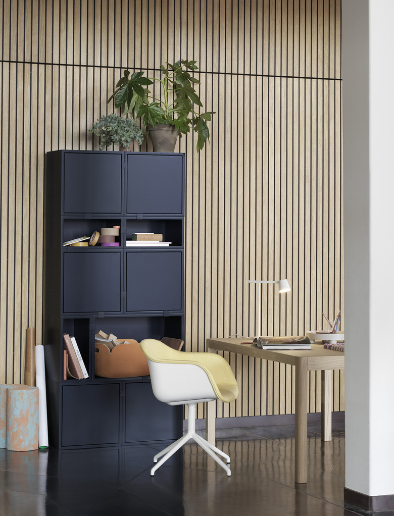 Scandinavian home office with wood panel walls