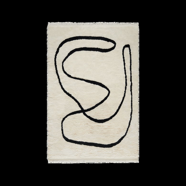 Black and white Scandinavian rug with abstract design