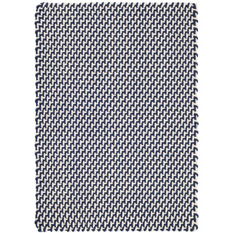 Navy and white Scandinavian rug with handwoven graphic details