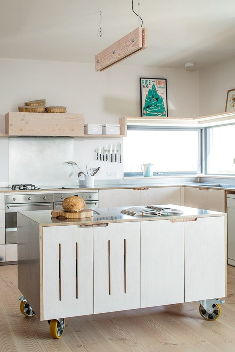 kitchen with moveable island by Sustainable Kitchens