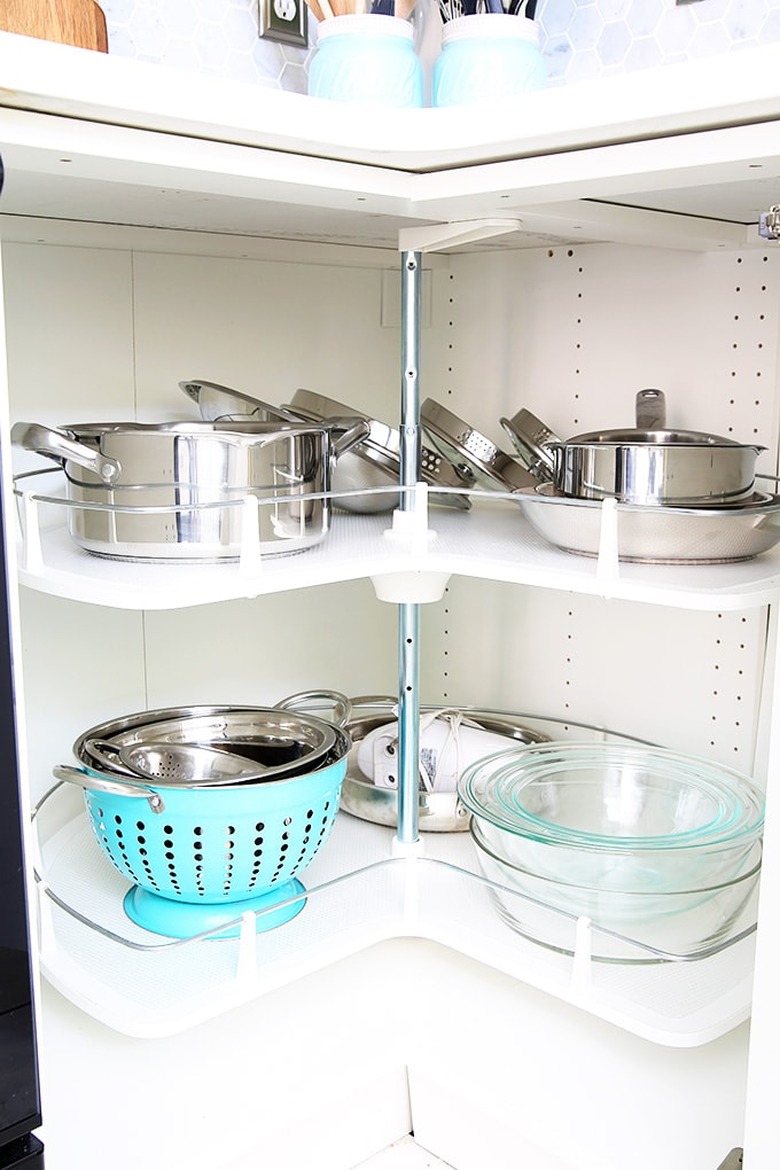 small kitchen organization idea with lazy Susan in cabinet