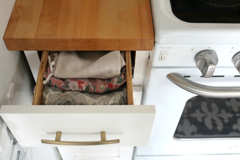 small kitchen organization idea with Marie Kondo folding technique
