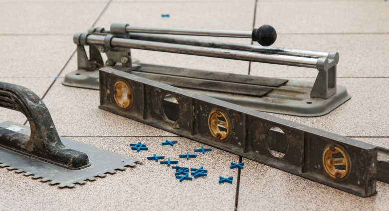 Installation of floor tiles