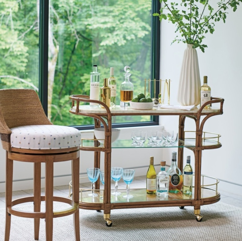 Bamboo and glass bar cart with vase