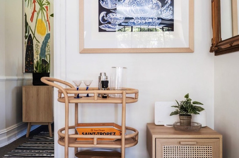 Bamboo bar cart with glassware