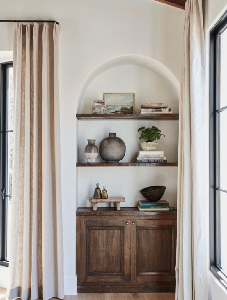 Book shelves above cabinet
