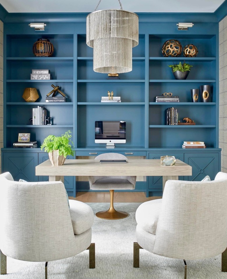 Blue built in book shelves