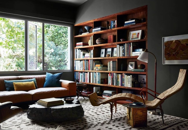 Modern living room with home library