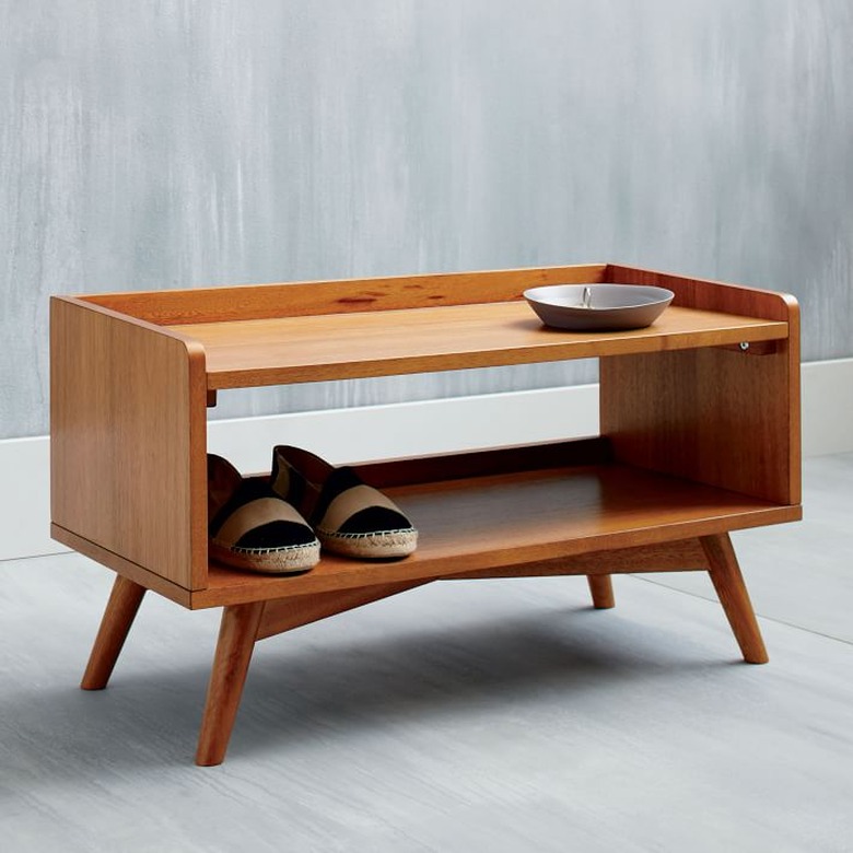 Midcentury modern wood shoe organizer.