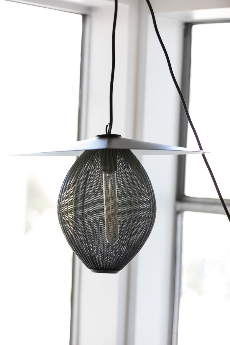 Gubi Satellite Pendant Lamp hanging near windows