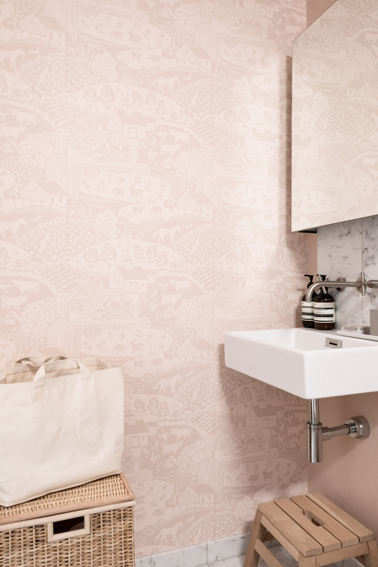 wooden stool under sink in bathroom