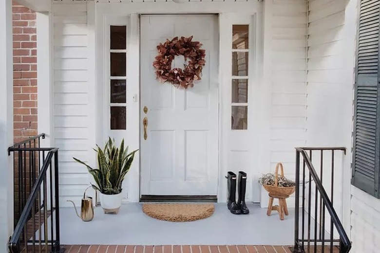 Porch with a white door