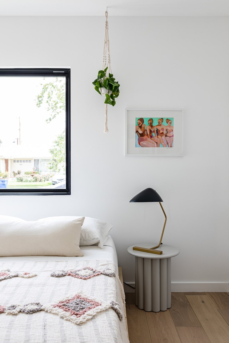Bedroom with side table with lamp