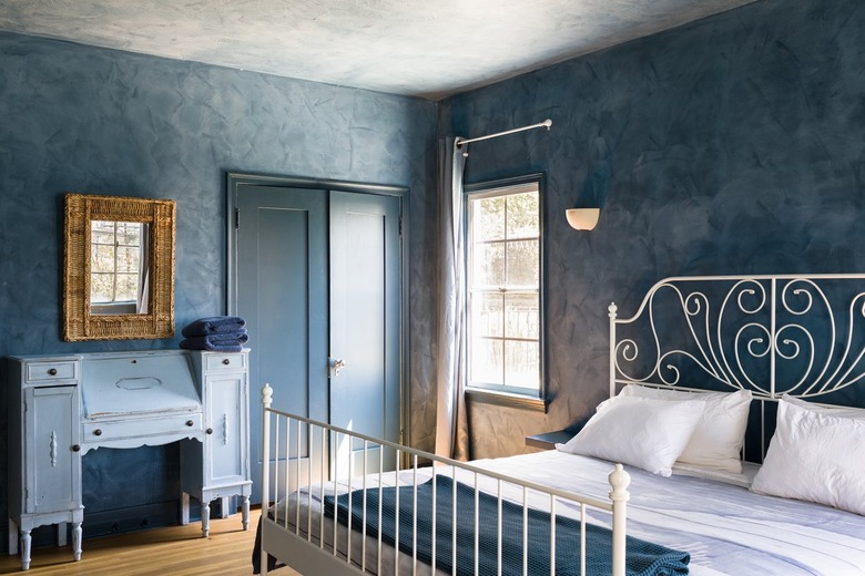 Bedroom with blue walls