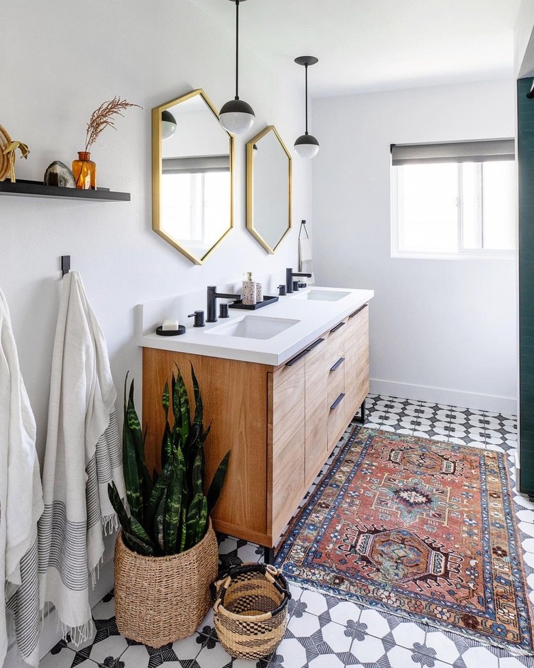 Boho bathroom with black and white mosaic tile
