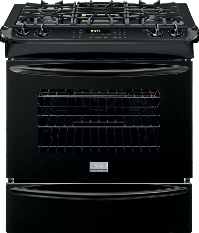Black small gas stove with storage drawer and grates
