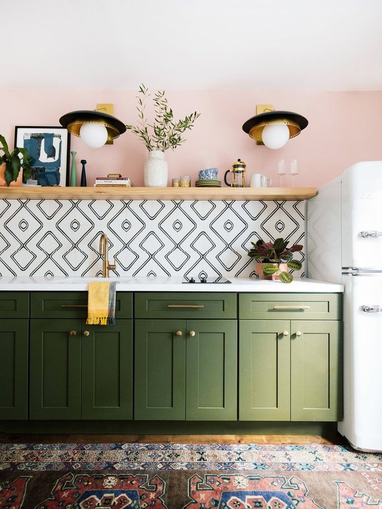 Maximalist kitchen with pink walls