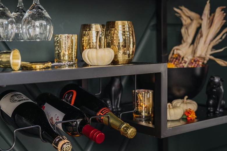 Bar cart with gold hammered goblets
