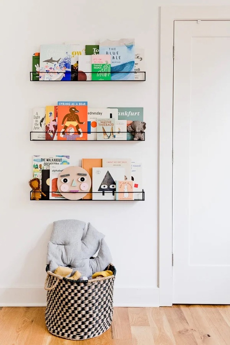 Books hanging on wall in nursery