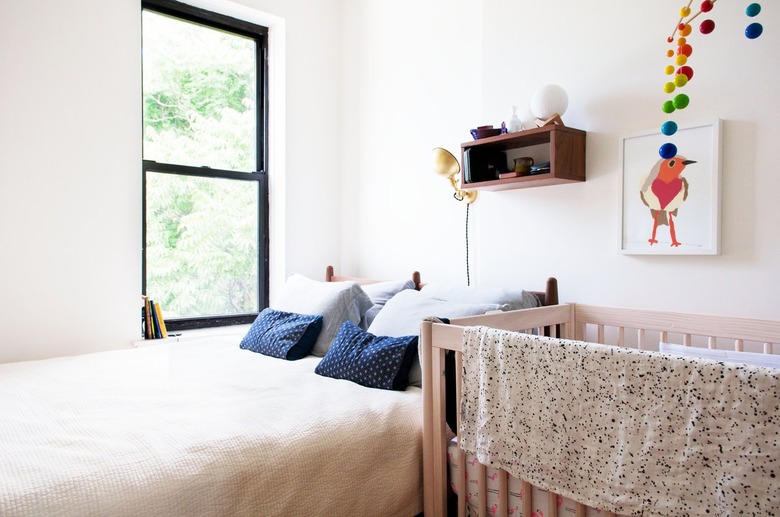 Bedroom with blue accent pillows