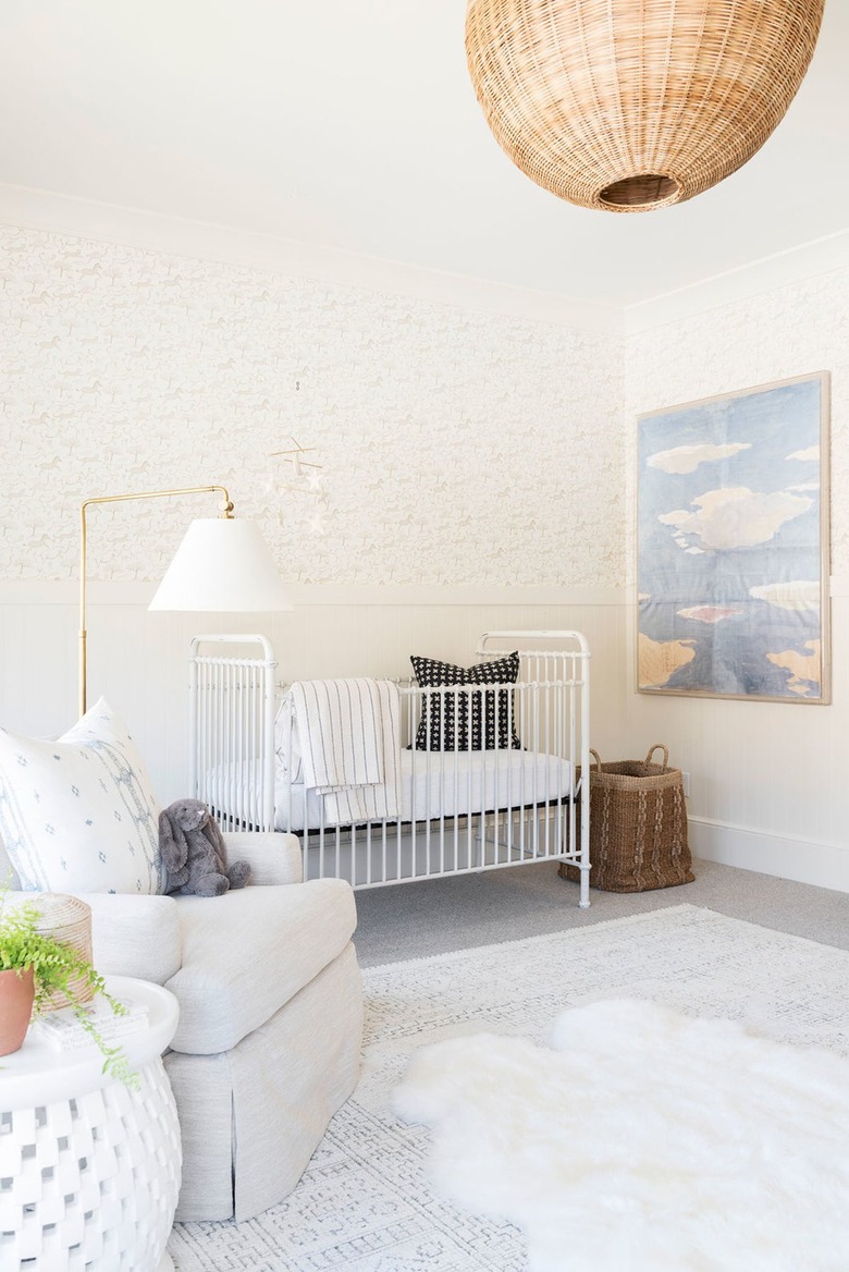 Neutral nursery with cloud painting