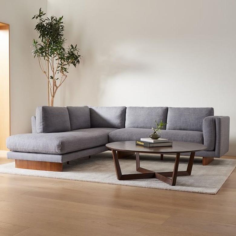 Grey sectional with wood accents