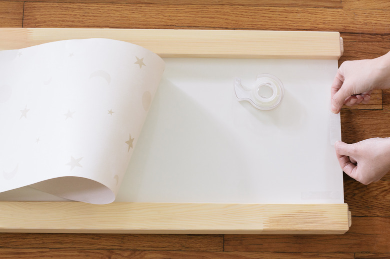 Taping wallpaper to KURA bed panels