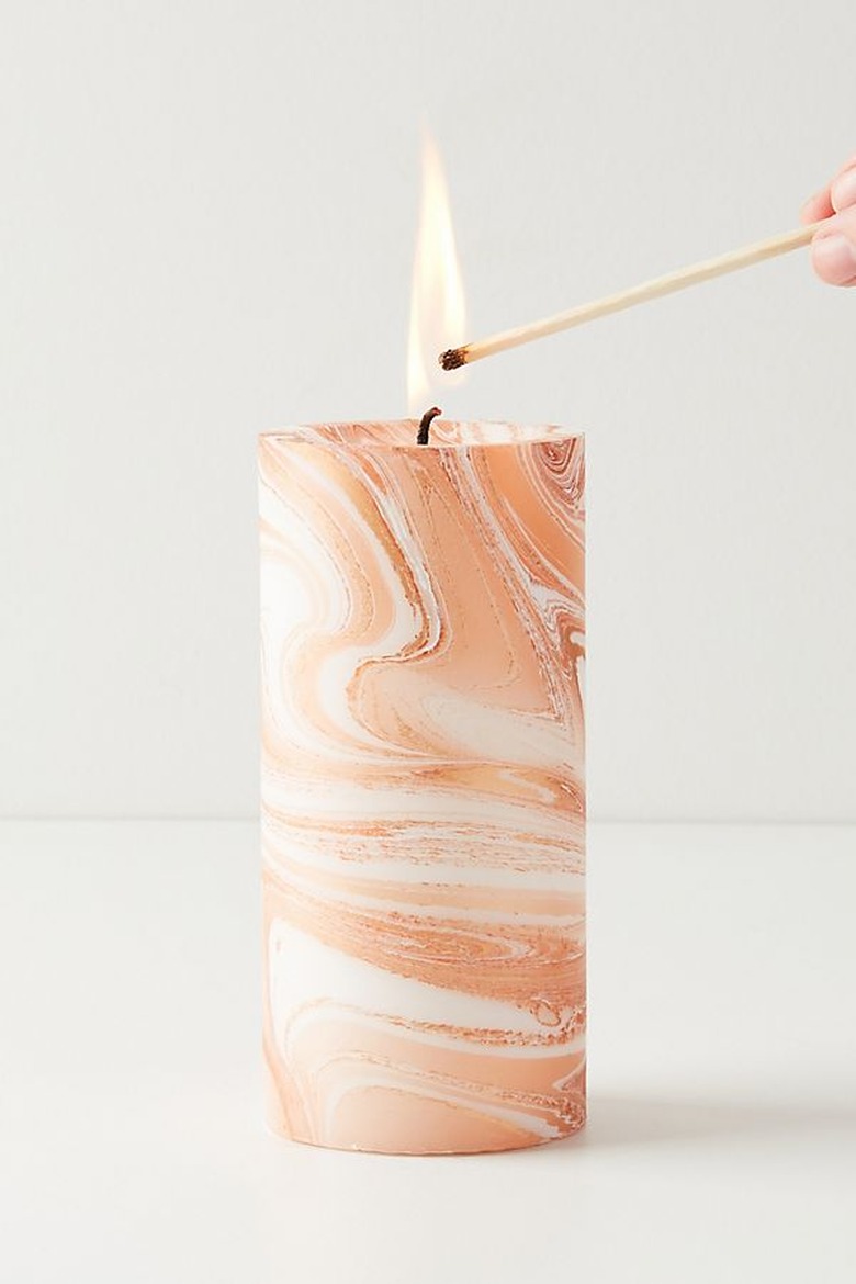 marbled orange pillar candle from Anthropologie
