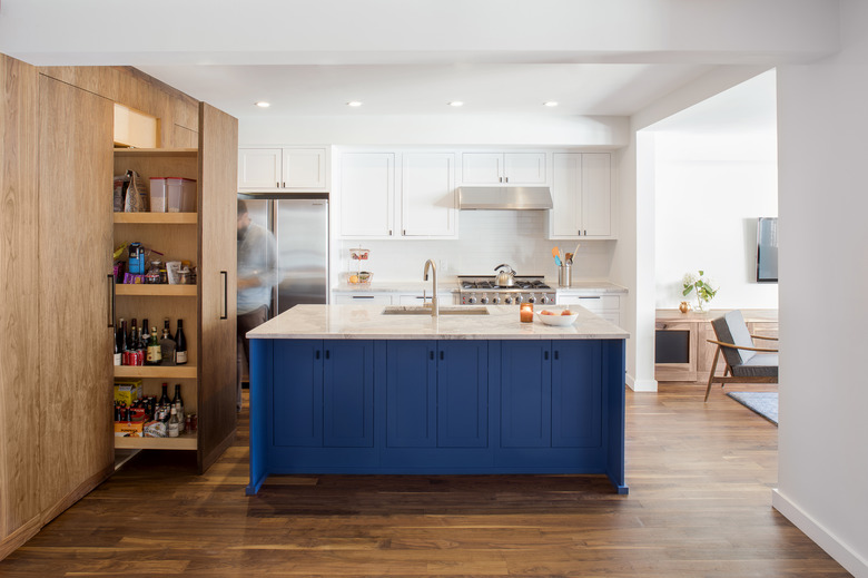 kitchen with white and blue cabinetry
